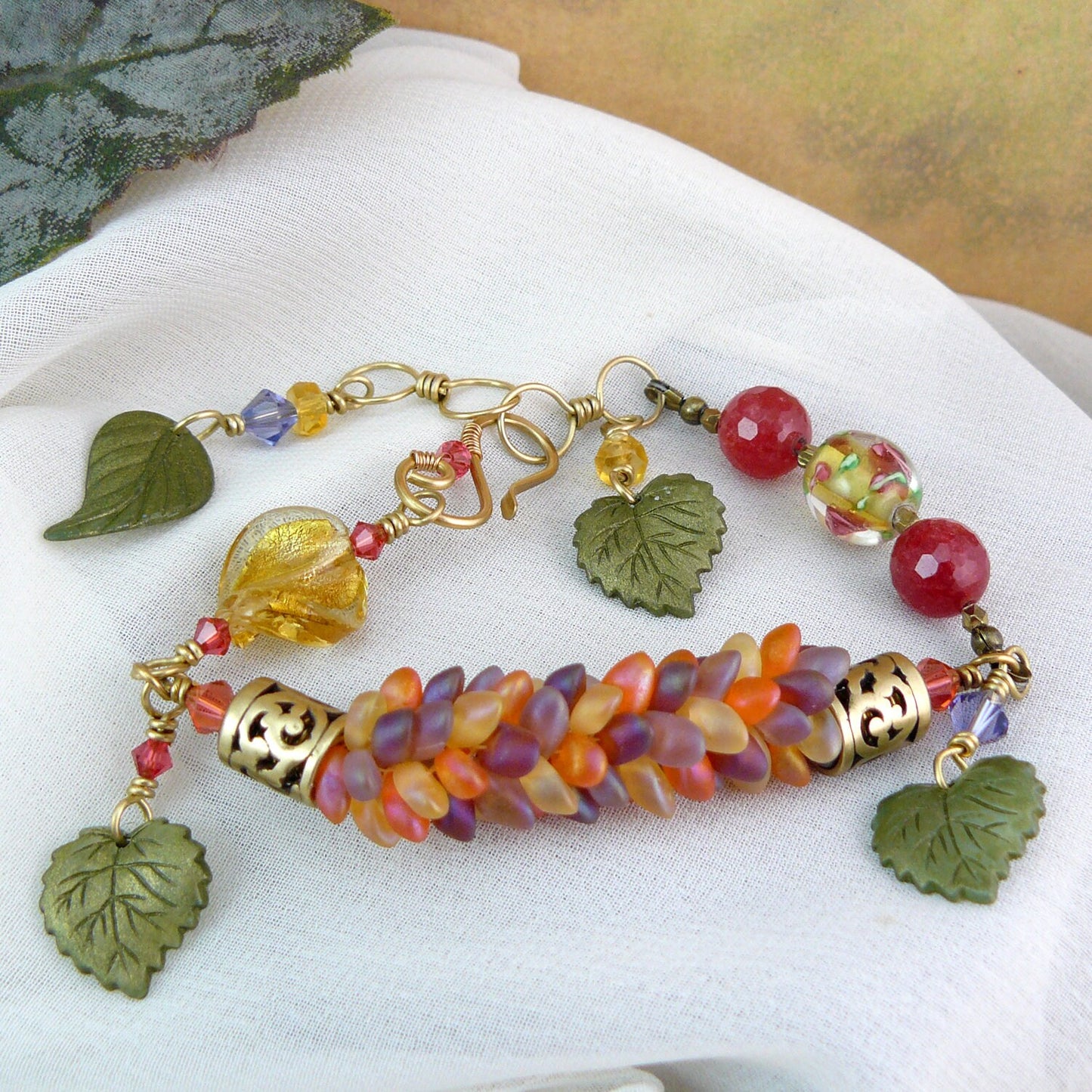 Leafy Dragon Scale Magatama Kumihimo Weave Bead Bracelet with Ruby Quartz
