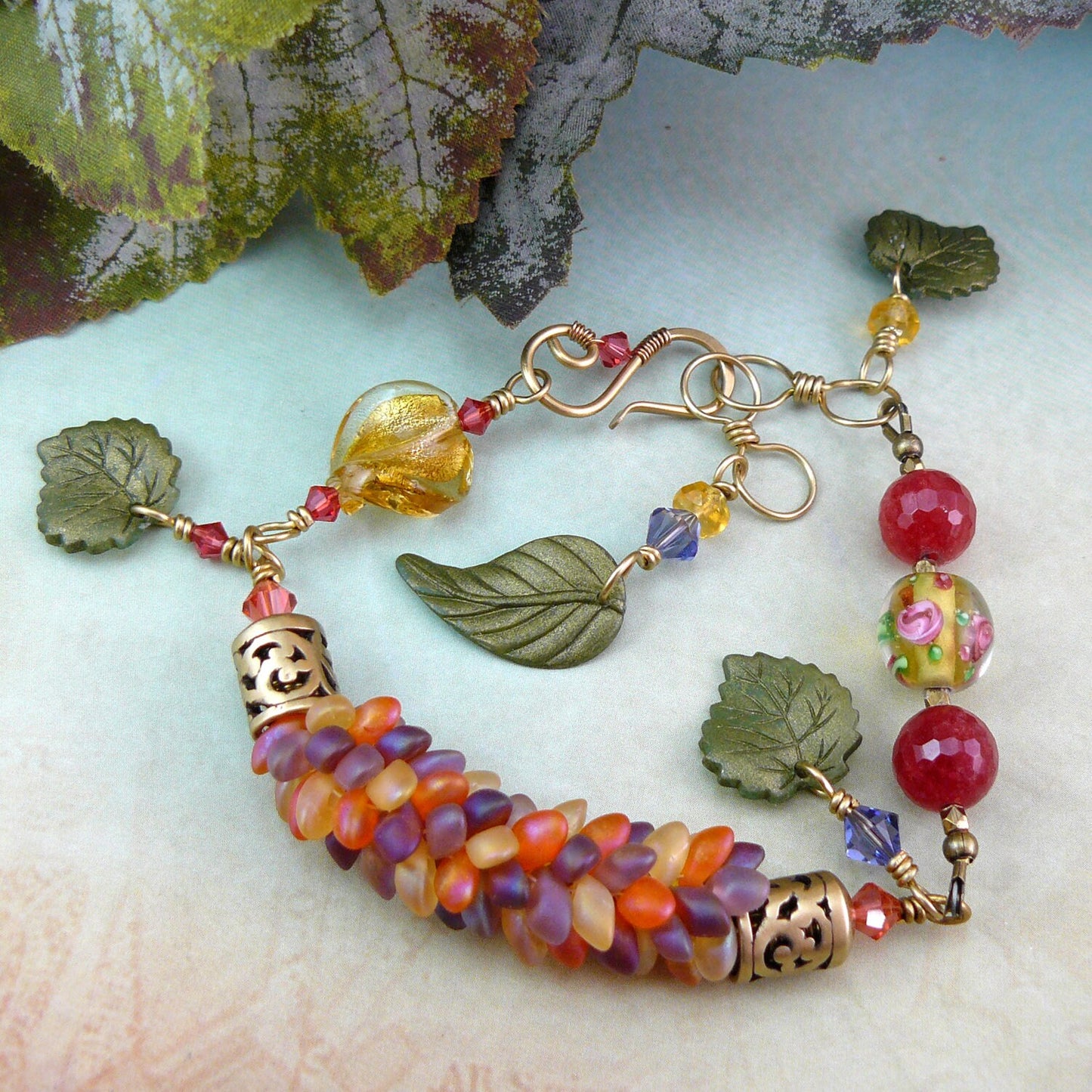 Leafy Dragon Scale Magatama Kumihimo Weave Bead Bracelet with Ruby Quartz