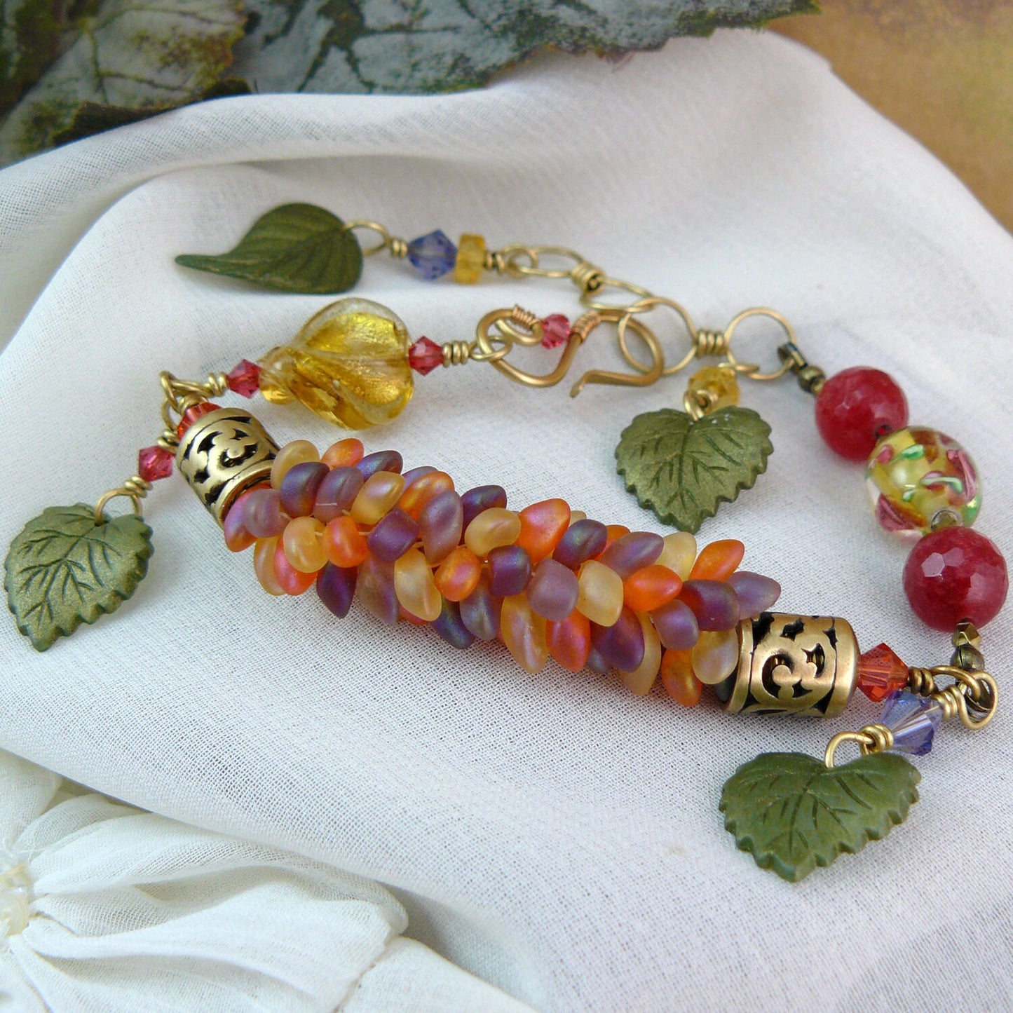 Leafy Dragon Scale Magatama Kumihimo Weave Bead Bracelet with Ruby Quartz