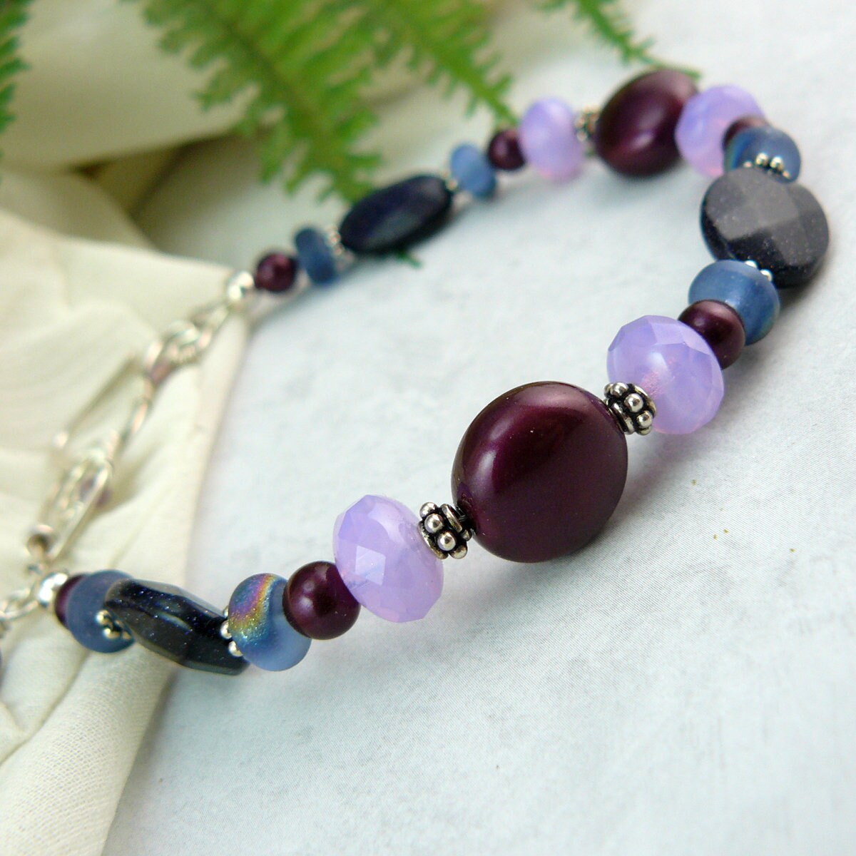 Elderberry Swarovksi Pearl and Shimmery Blue Goldstone Bead Bracelet
