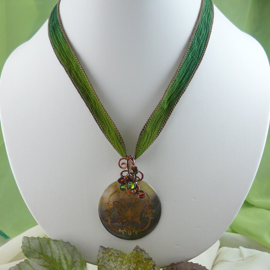 Wire Wrapped Gold and Green Butterfly Black Lip Shell Pendant