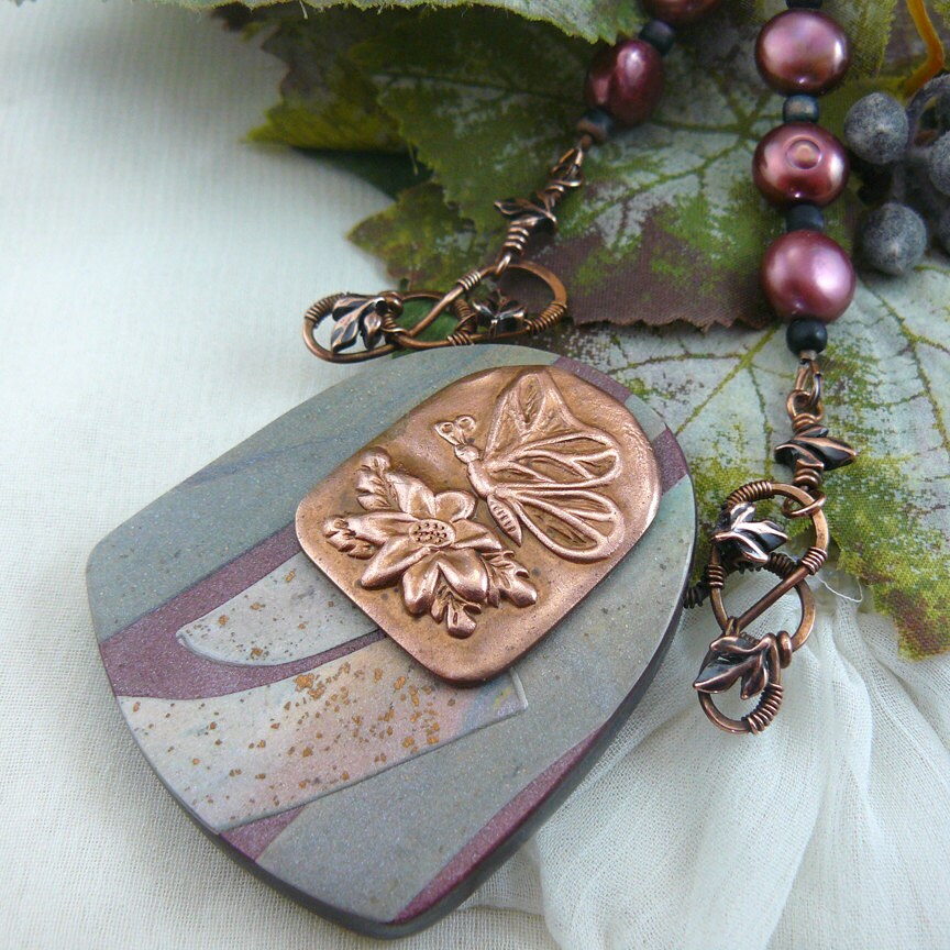 Earthy Copper Butterfly Emblem and Polymer Clay Shield Necklace