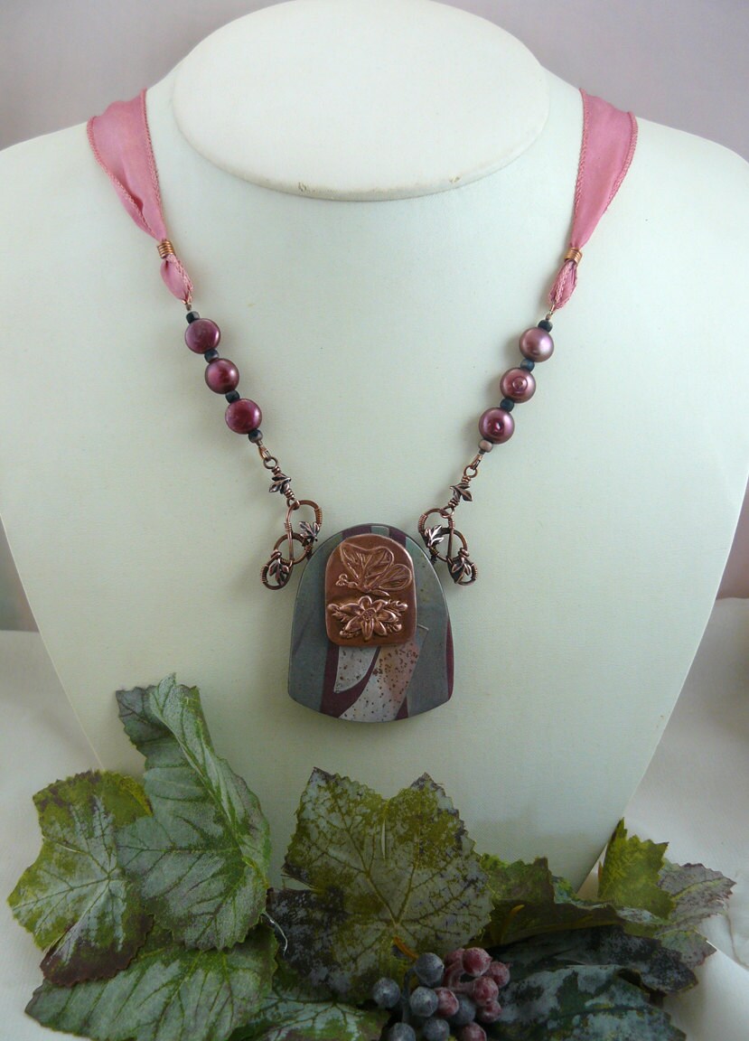 Earthy Copper Butterfly Emblem and Polymer Clay Shield Necklace