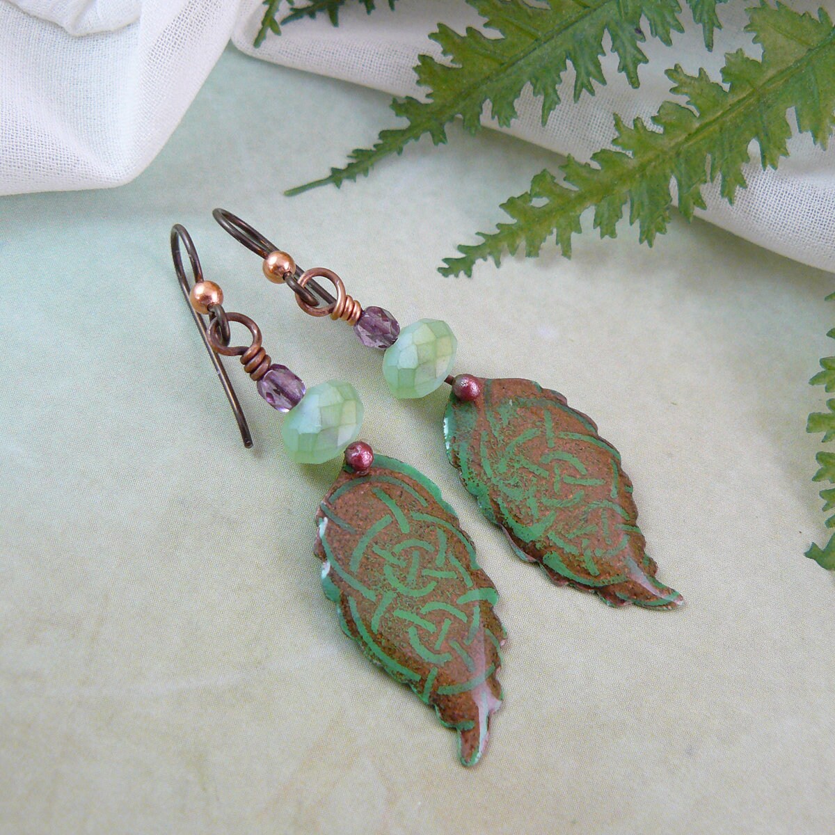 Celtic Knot Green Leaf Dangle Earrings with Copper Colored Niobium Ear Wires