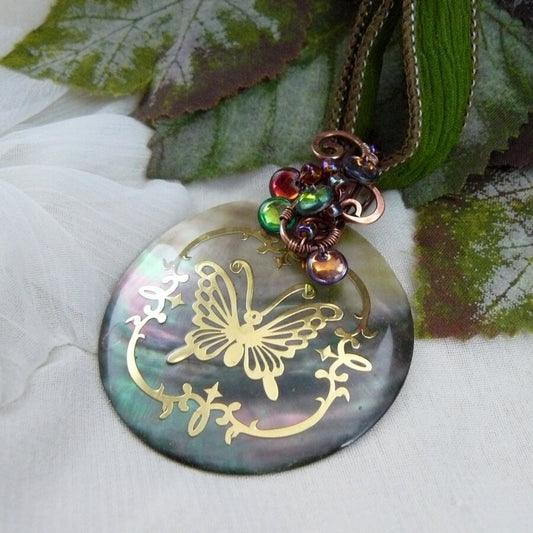 Wire Wrapped Gold and Green Butterfly Black Lip Shell Pendant