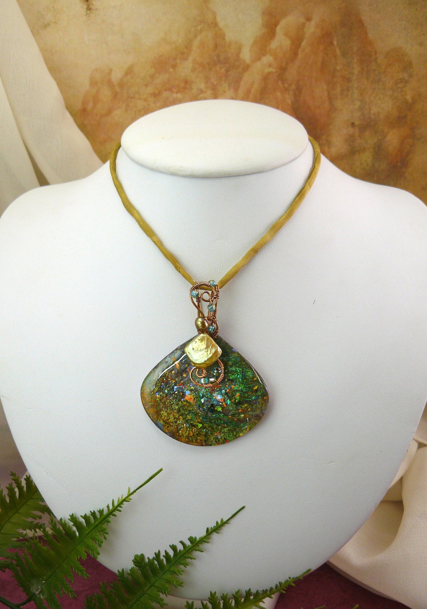 Gold and Green Resin Pendant Wire Wrapped in Bronze, Fan Shaped and Finished with a Freshwater Pearl and a Golden Silk Neck Cord