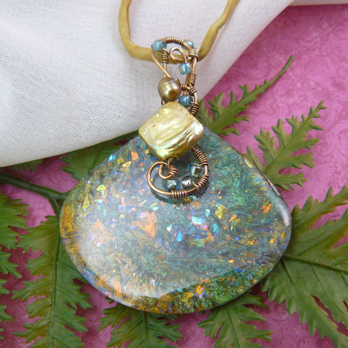 Gold and Green Resin Pendant Wire Wrapped in Bronze, Fan Shaped and Finished with a Freshwater Pearl and a Golden Silk Neck Cord