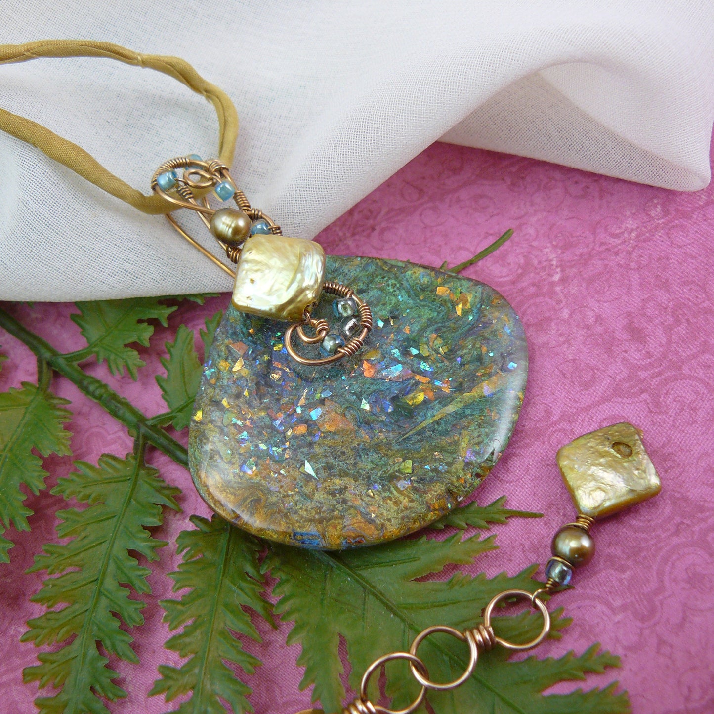 Gold and Green Resin Pendant Wire Wrapped in Bronze, Fan Shaped and Finished with a Freshwater Pearl and a Golden Silk Neck Cord